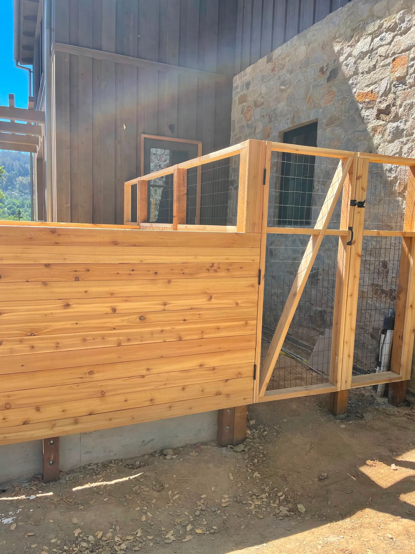 Cedar fence and gate built by Double Y Framing