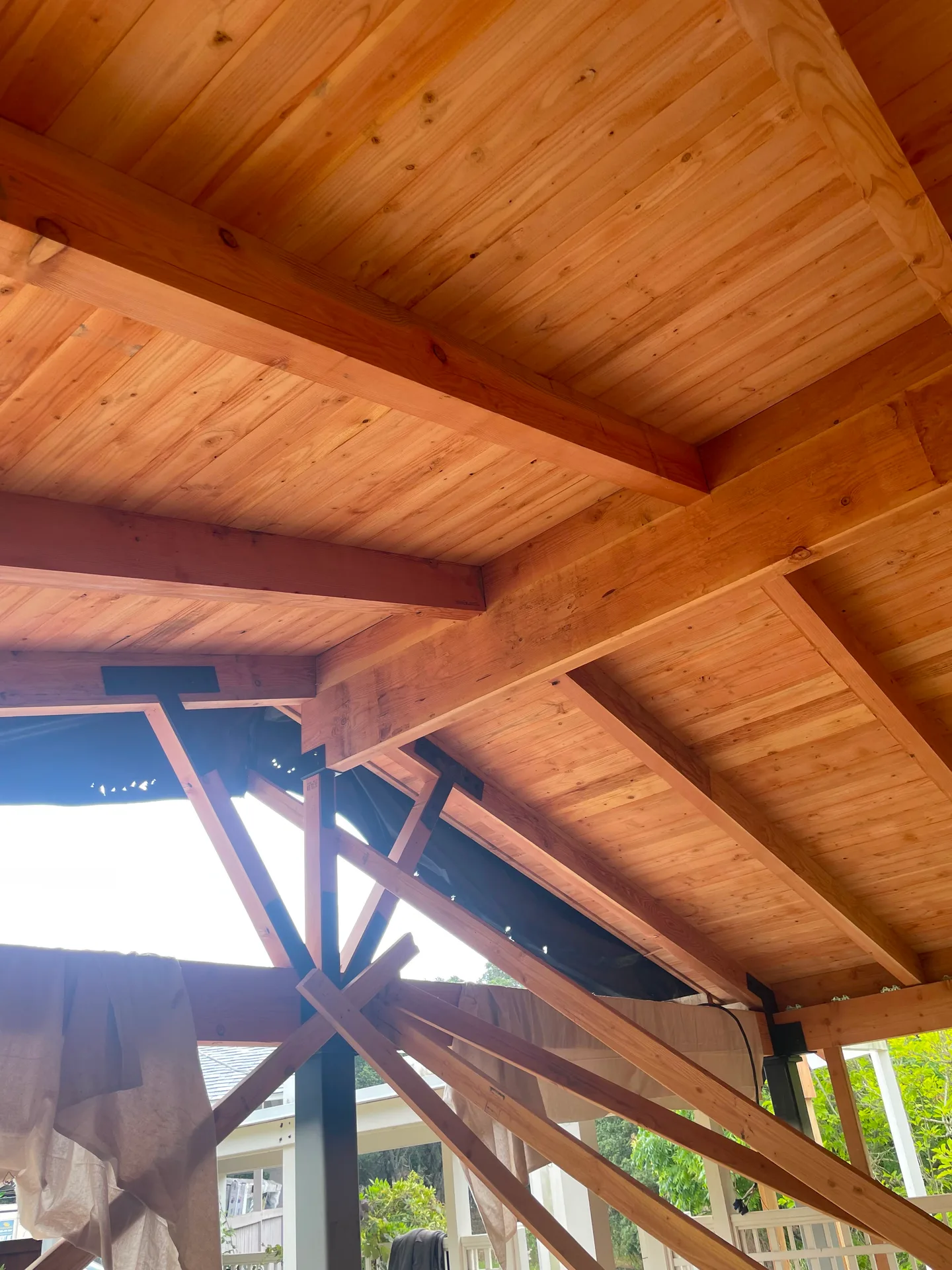 Finished wood pergola built by Double Y Framing