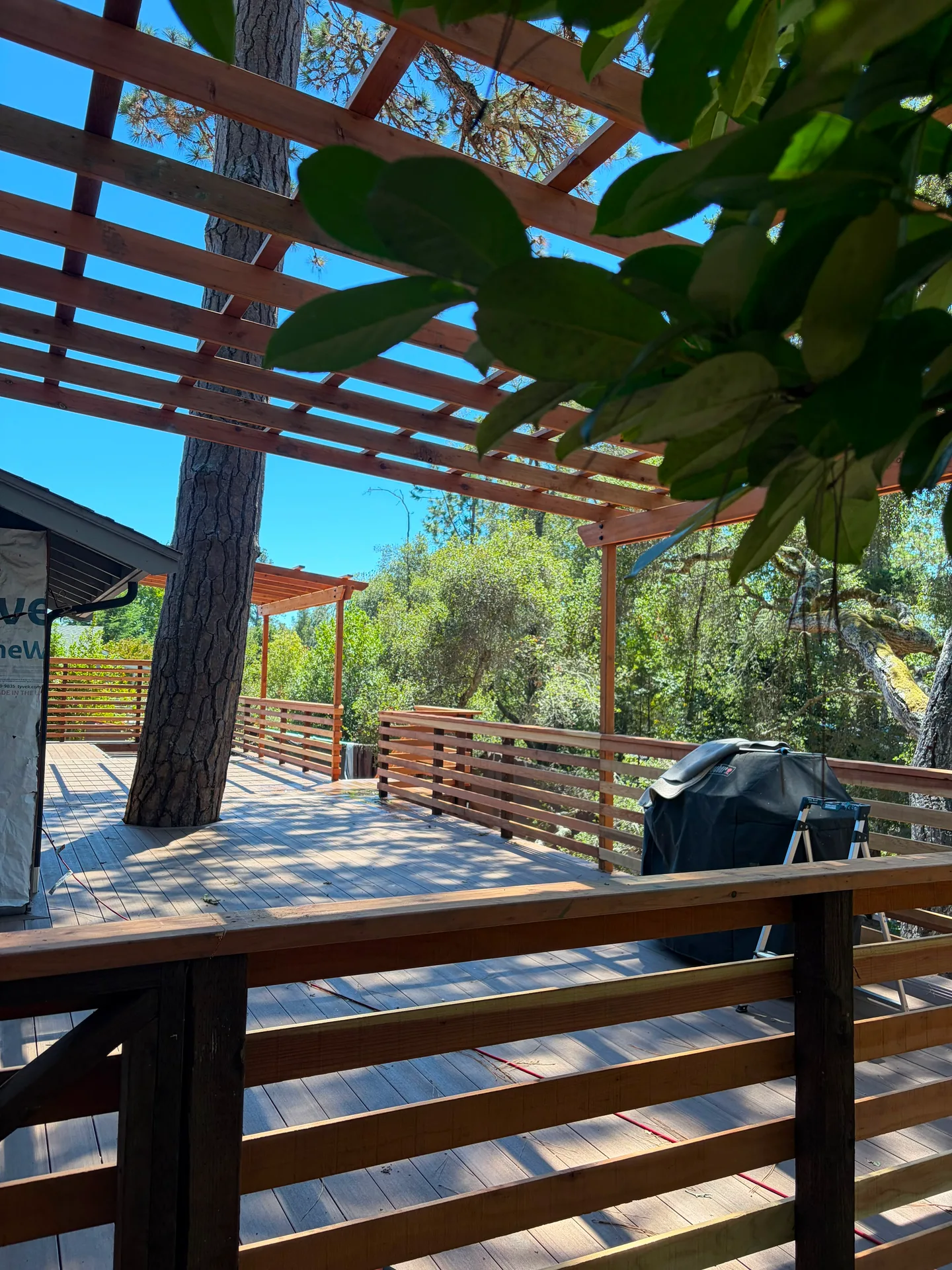 Finished pergola built over a deck