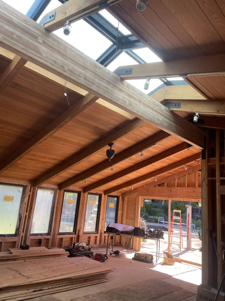 Exposed wood beam ceiling in a custom home built by Double Y Framing