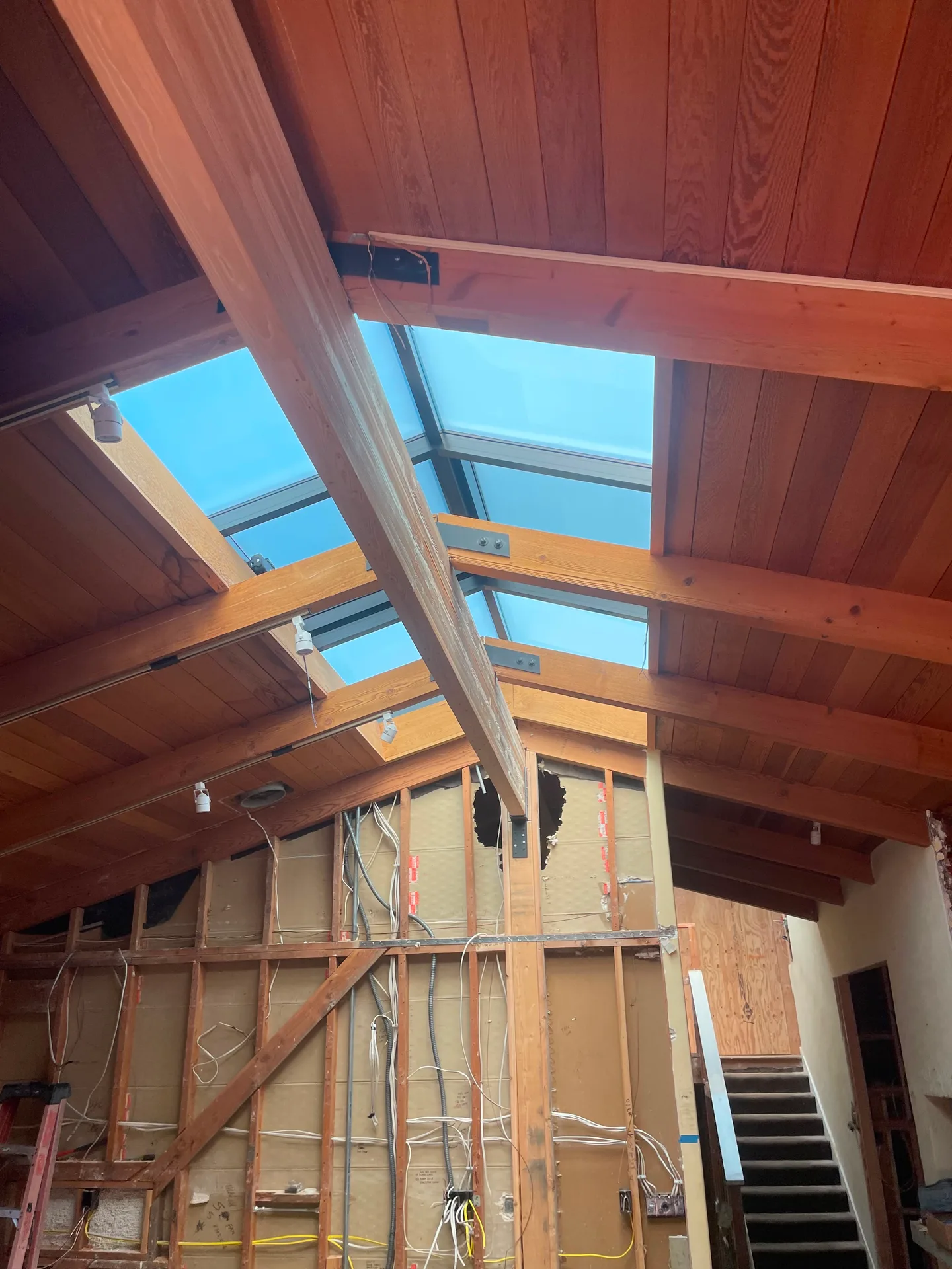 Interior skylight framing above a staircase