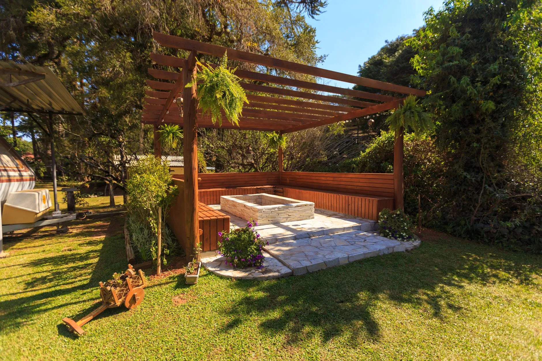 Wood pergola built over a backyard patio